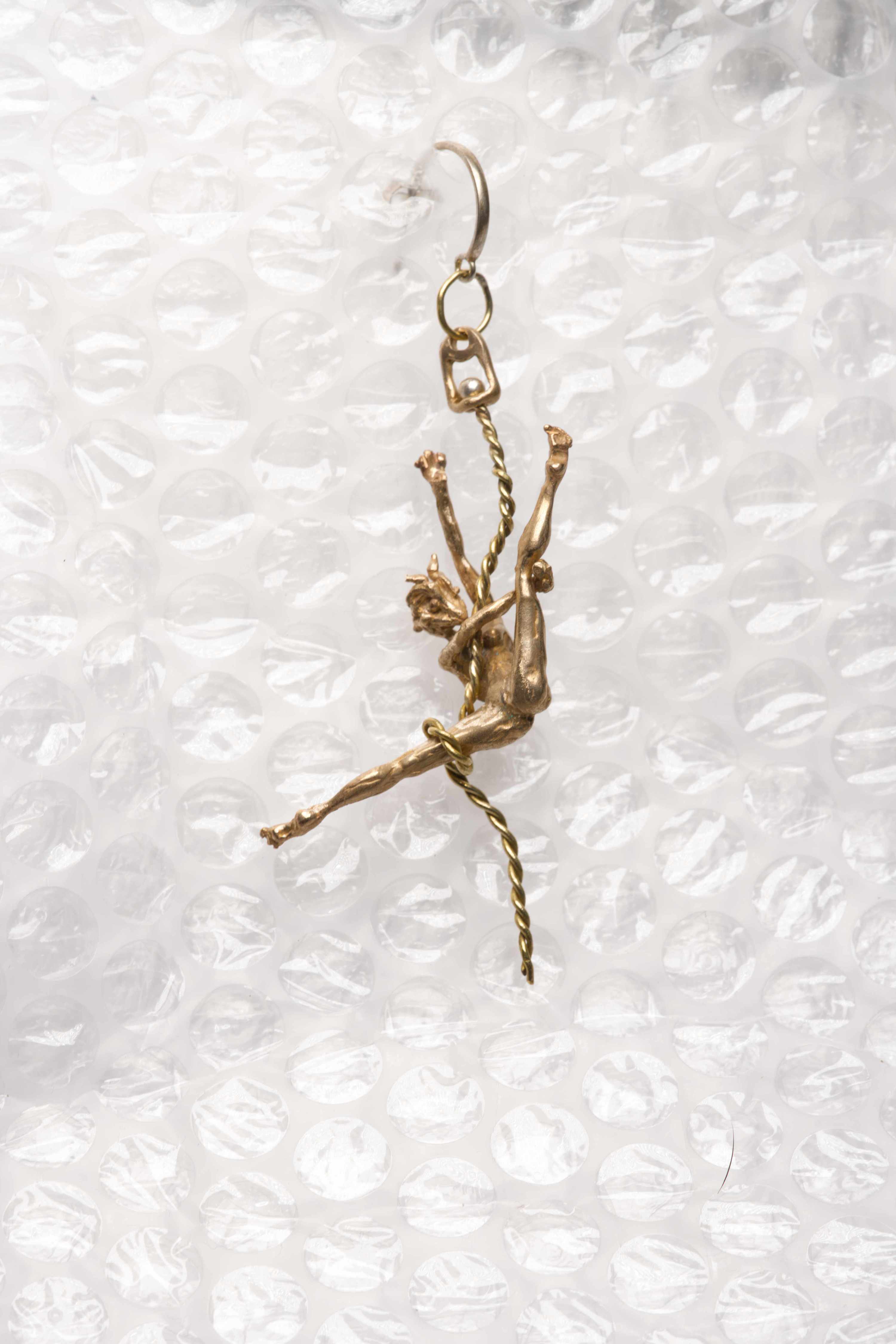 Poledancer earing, close up shot, product photography